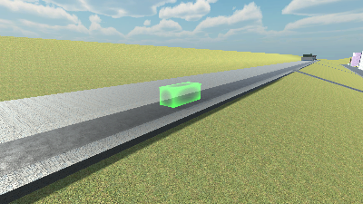 The green delivery zone trigger volume on a road in the city demo, seen from the Game view.
