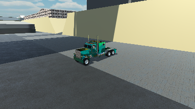 The included truck prefab parked in the demo city, ready to pick up a trailer.
